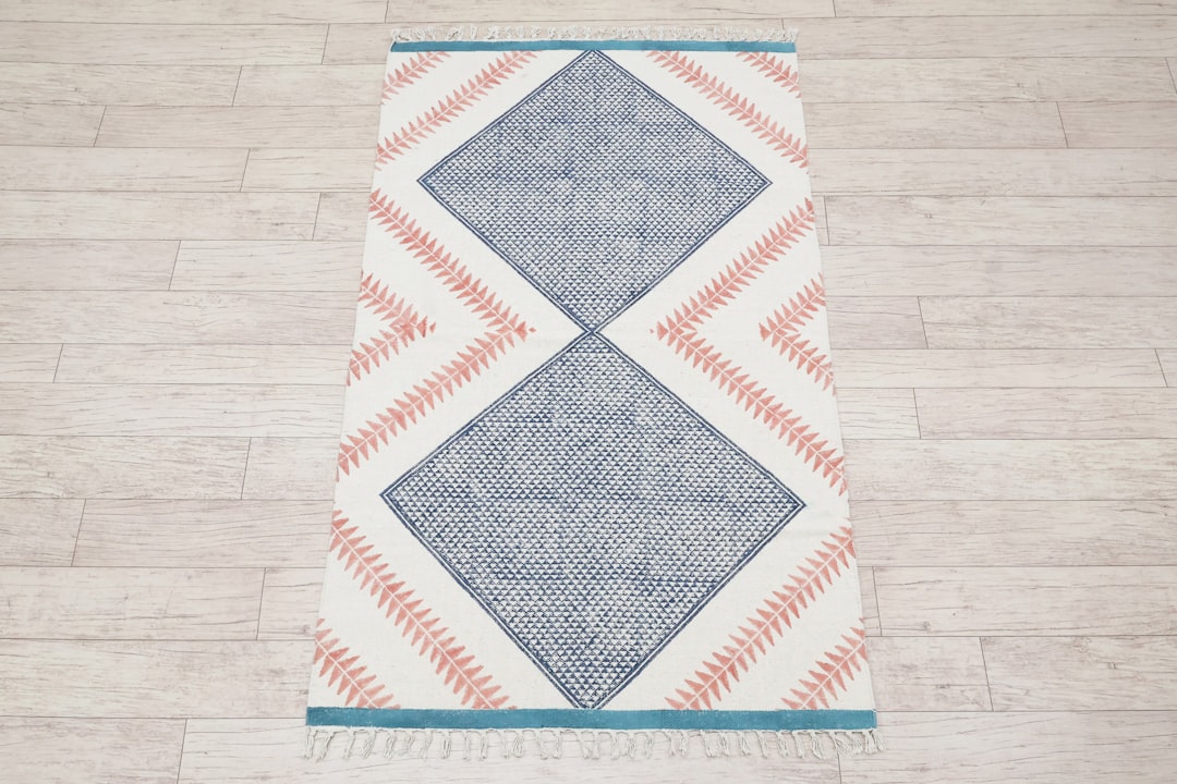 Handmade cotton rug with tassels featuring blue and pink geometric design, perfect boho hallway runner or area rug, adding warmth, texture, and artisanal charm to modern and traditional interiors. Shop Now:- https://www.etsy.com/listing/1906565397/handmade-cotton-rug-with-tassels-boho